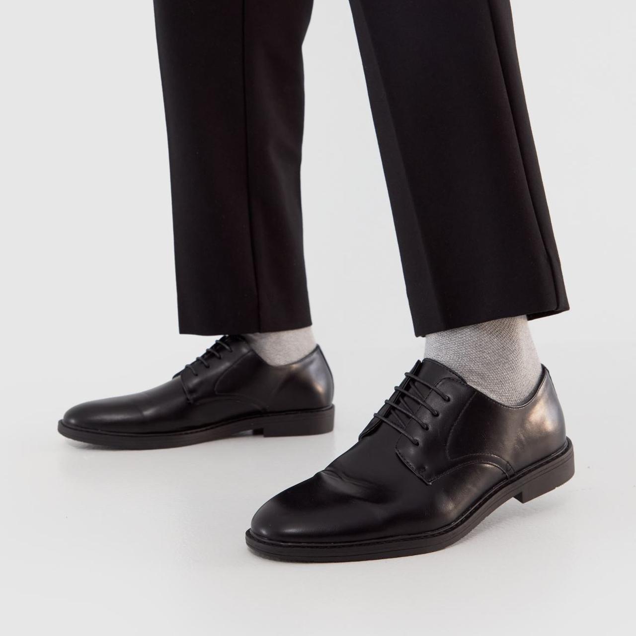 Melvin Pu Derby in Black