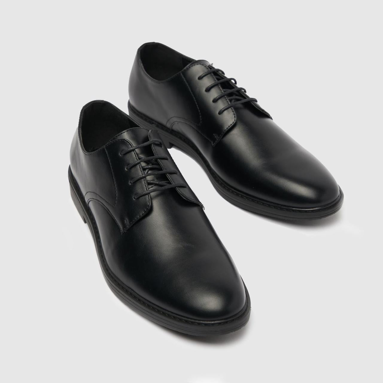 Melvin Pu Derby in Black